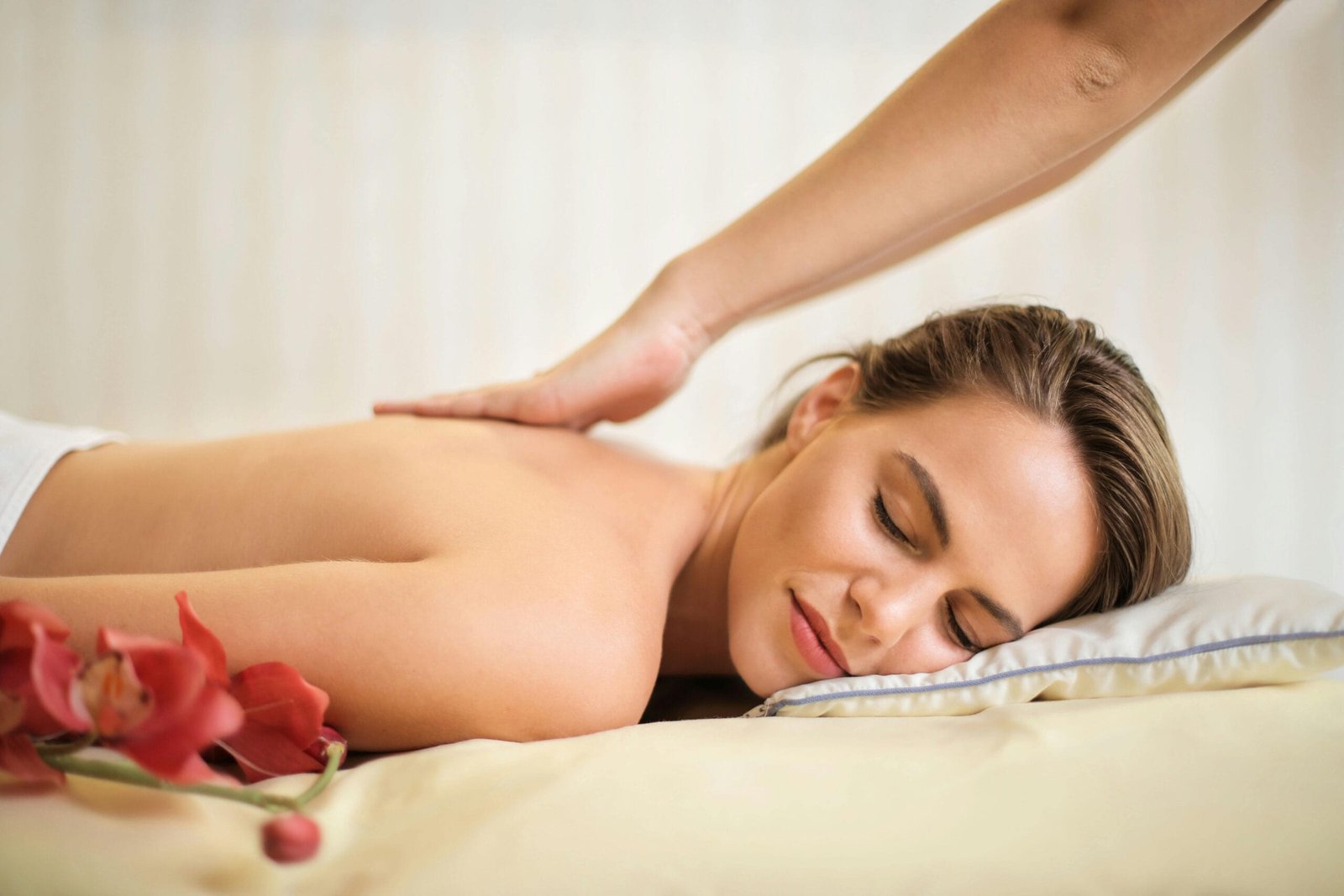 Woman getting a swedish massage on a massage table